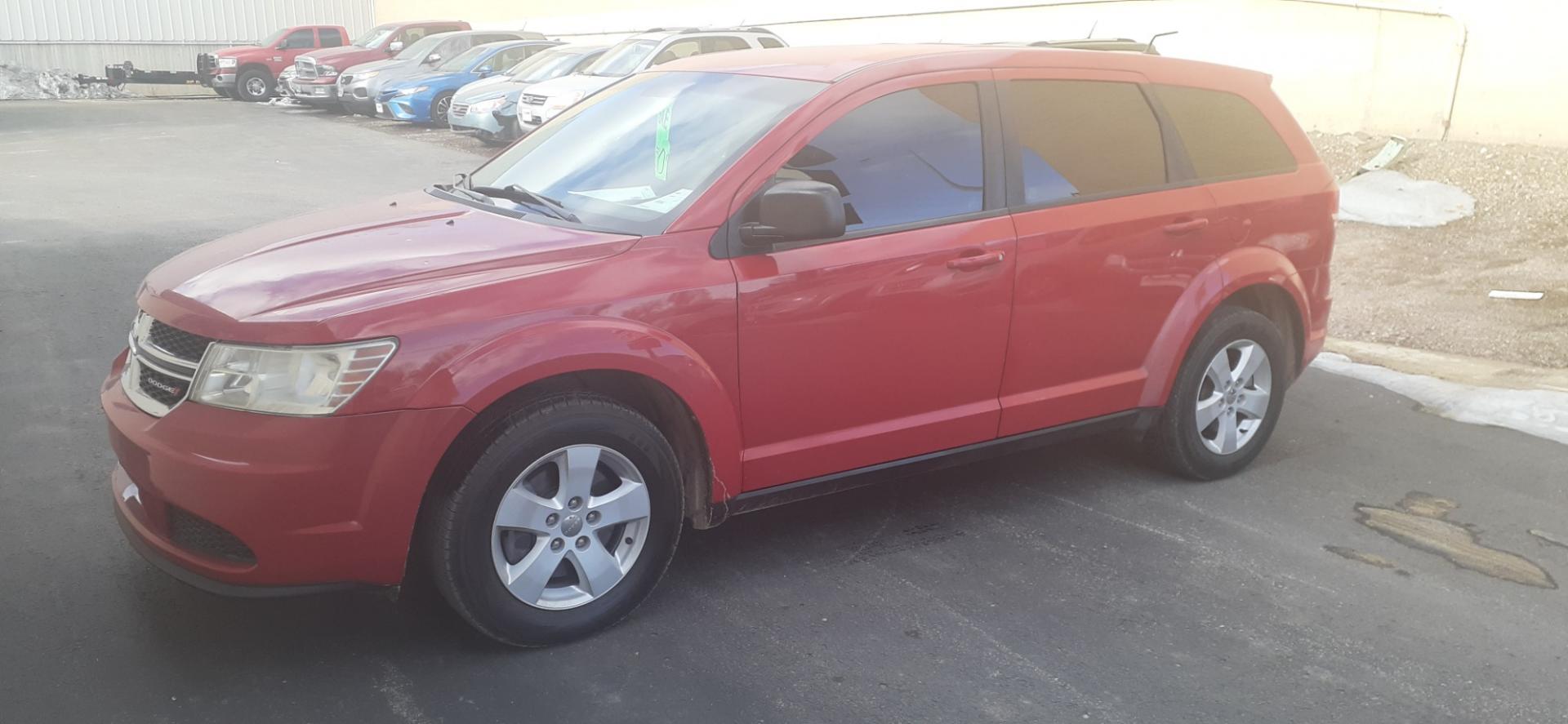 2013 Dodge Journey SE (3C4PDCAB4DT) with an 2.4L L4 DOHC 16V engine, 4-Speed Automatic transmission, located at 2015 Cambell Street, Rapid City, SD, 57701, (605) 342-8326, 44.066433, -103.191772 - Photo#3